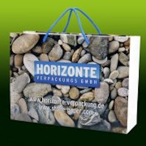 Die Tragetasche aus Steinpapier, dem ökologischen Papierersatz Die Tragetasche aus Steinpapier, dem ökologischen Papierersatz