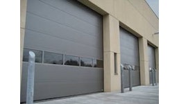 Promotherm Sektionaltore – für eine moderne Industrie-Architektur Promotherm Sektionaltore – für eine moderne Industrie-Architektur