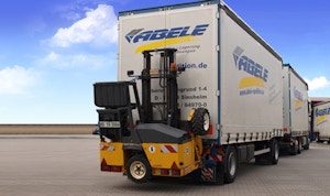 Lkw mit Einrichtung zur Selbstentladung und Mitnahmestapler Lkw mit Einrichtung zur Selbstentladung und Mitnahmestapler